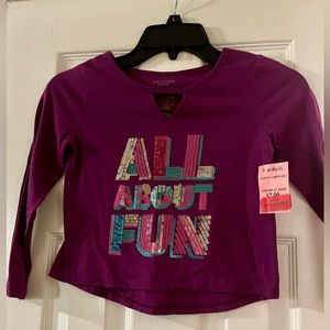 Never wore, tags still on! Purple crop top for little girl
